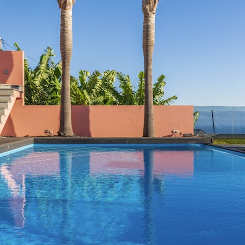 Take a dip in the blue waters of the private pool