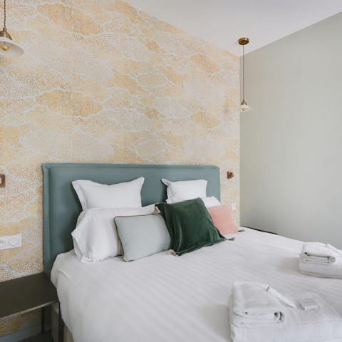 Enjoy a blissful night's sleep in the soothing bedrooms