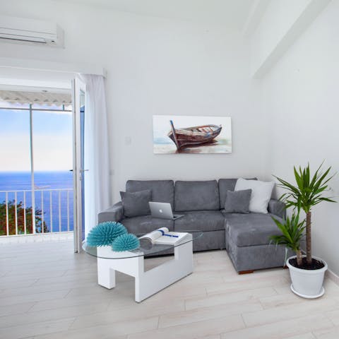 Cosy up on the plump sofa with a movie as dusk descends
