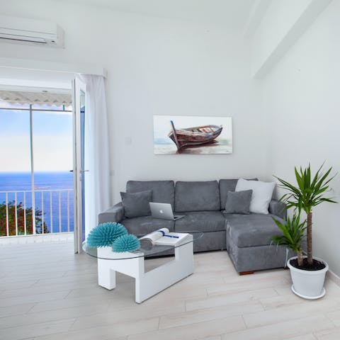 Cosy up on the plump sofa with a movie as dusk descends