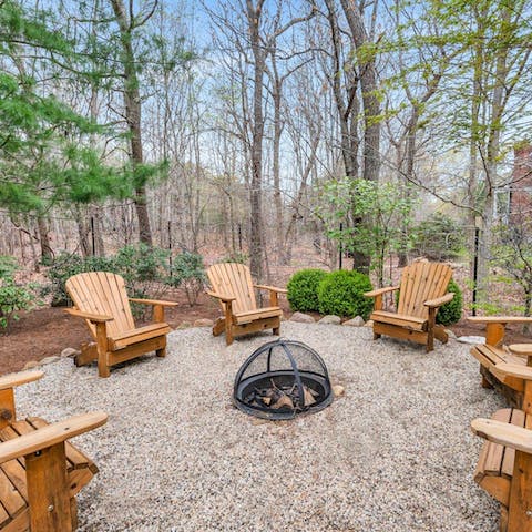 Gather round the fire pit for drinks, sharing stories in the serene surroundings