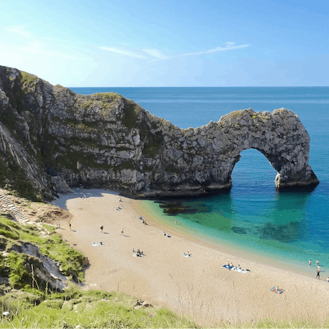 Take a forty-minute drive to visit the striking, limestone Durdle Door