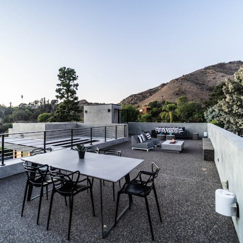 Revel in the rooftop panoramas as you chill out around the fire pit
