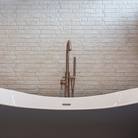 Have a lovely soak in the freestanding bathtub, located in the main bedroom en-suite
