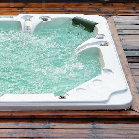 Treat your muscles to a soothing soak in the hot tub