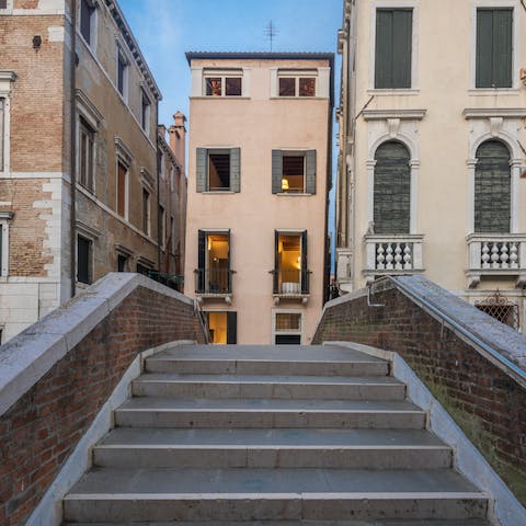 Step outside and stroll the atmospheric streets towards St. Mark’s Square 