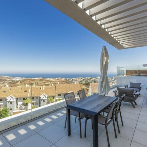 Gather on the terrace with a glass of sangria and admire the sea views