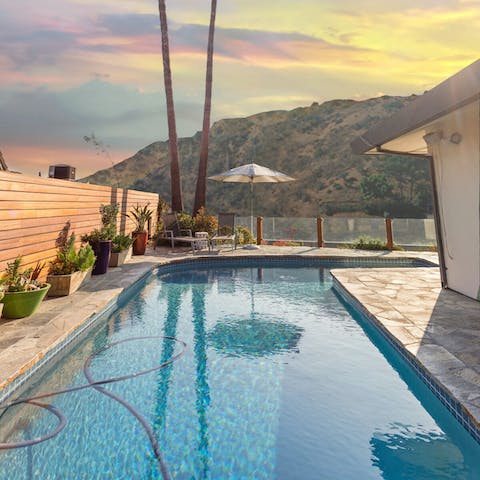 Take in views of the Hollywood Hills while swimming laps in the pool