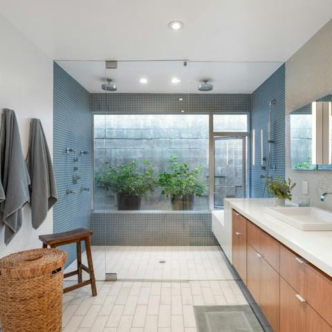 Take a refreshing shower in the spa–like bathroom
