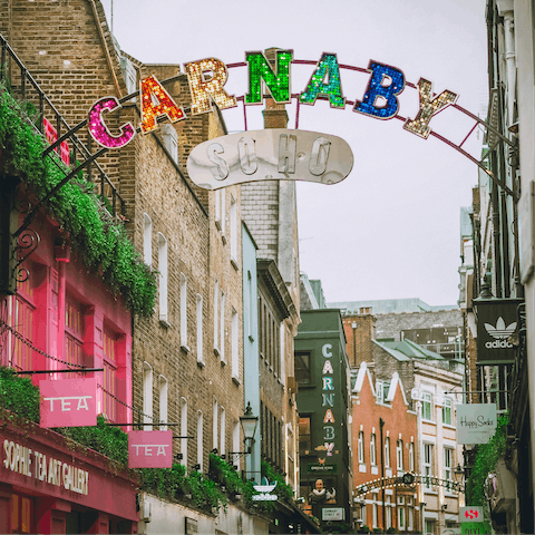 Take a fifteen-minute walk to Soho's Carnaby Street for shopping and drinks