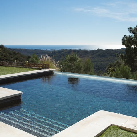 Gaze at the Mediterranean Sea as you cool off in the private pool