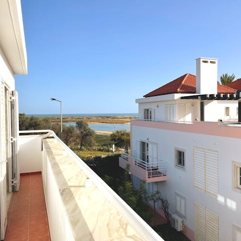 Look out to views of the Ria Formosa lagoon from your private balcony