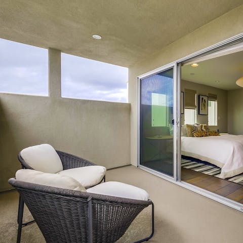 Step onto the private balcony from the master bedroom