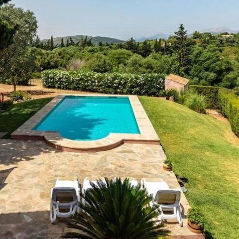 Savour views of the Mallorcan countryside from the pool