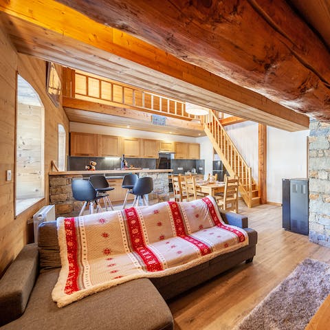 Snuggle up on your comfortable sofa after a day out on the slopes