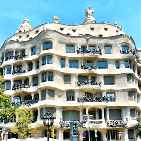 Head to the incredible rooftop of Casa Milà, a five-minute walk from home