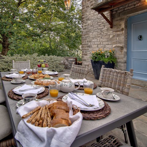 Dine outside on the home's peaceful courtyard