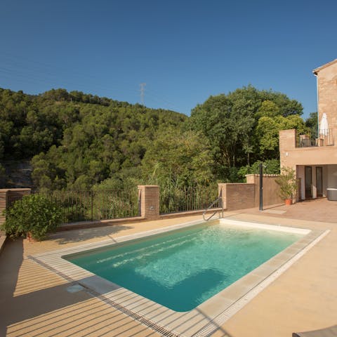 Head to the shared pool for a moment overlooking the trees