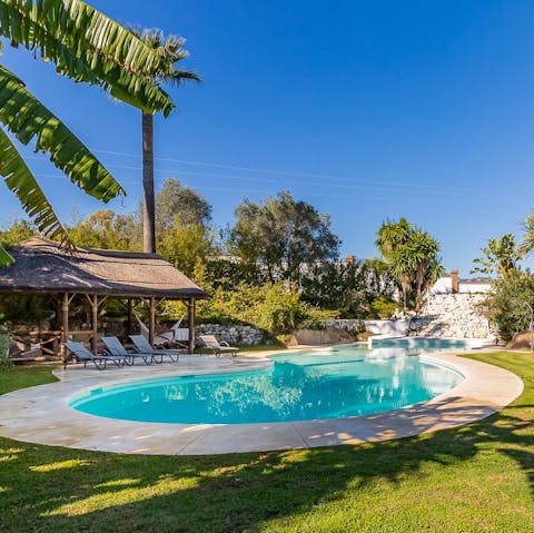 Take a refreshing swim in the private pool 