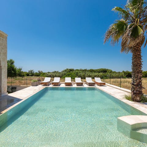 Soak up the golden rays from beside your private pool