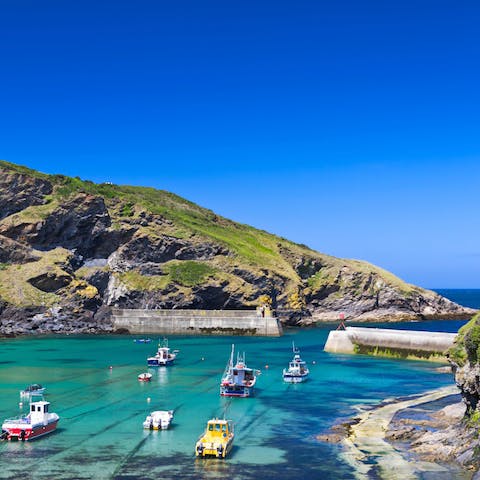 Visit the picturesque fishing village of Port Isaac, a thirteen-minute drive away