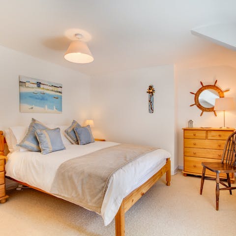 Wake up in the comfortable nautical-themed bedrooms feeling rested and ready for another day of exploring Cornwall's coast