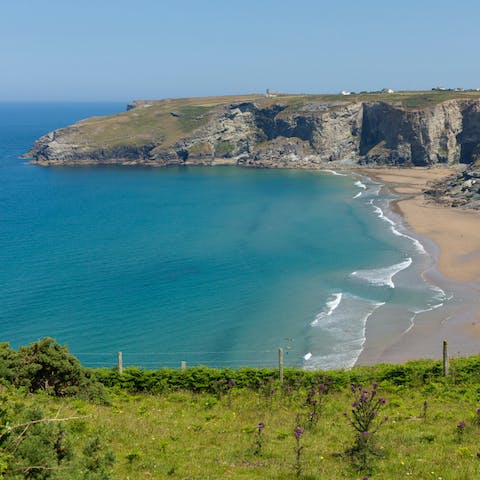 Sink your toes in the sand at Trebarwith Beach also thirteen minutes away by car
