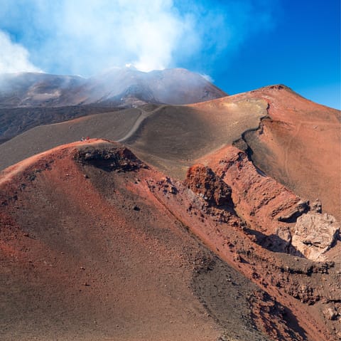 Drive over to the National Park that surrounds Mount Etna in only twenty-five minutes