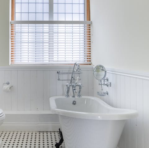 Relax in the huge free standing bath tub after a day of exploring Osea Island 