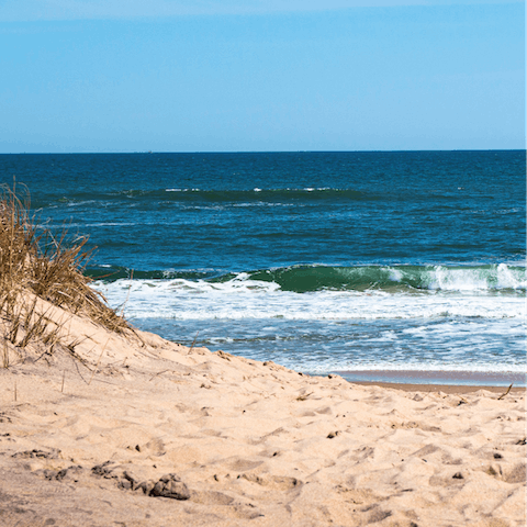 Relax on the sands of Little Plains Beach, just a fourteen-minute walk away