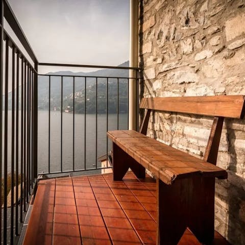 Enjoy drink on the balcony while gazing out to the lake