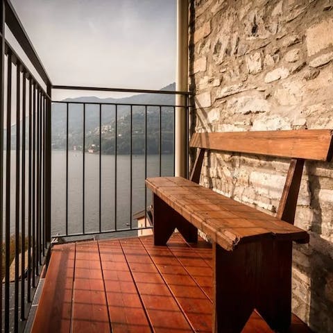 Enjoy drink on the balcony while gazing out to the lake