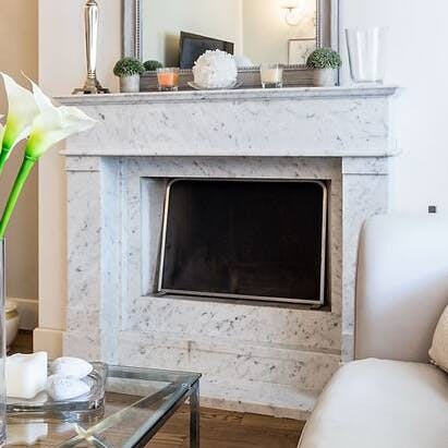 Admire original features such as the Italian marble fireplace