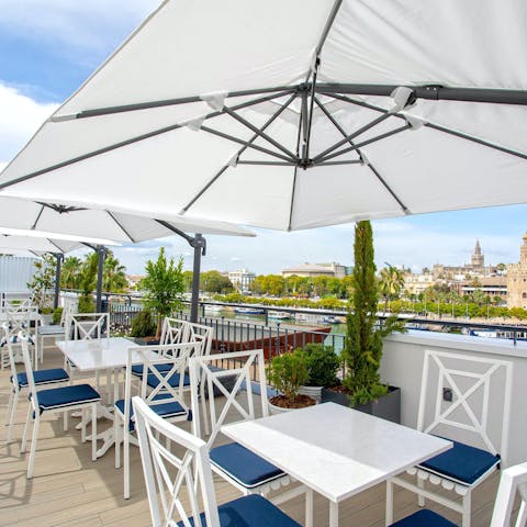 Sip a glass of something chilled on the communal terrace