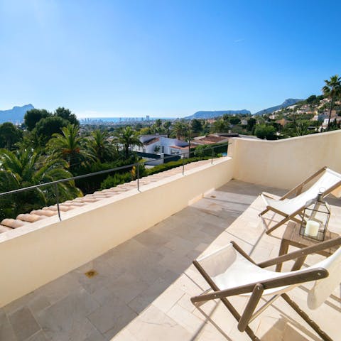 Enjoy elevated views over the Costa Blanca from the sunny balcony