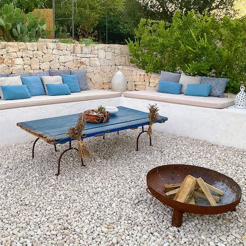 Light a fire and snuggle up in your luxurious seating area as the sun sets