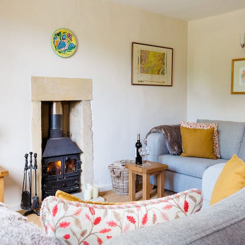 Snuggle up in front of the wood-burning stove, watching movies and playing board games