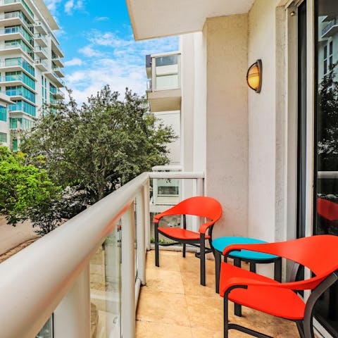 Enjoy a glass of wine on your balcony in the evening