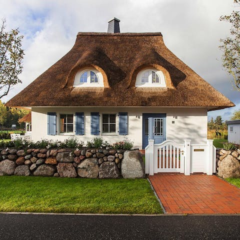 Stay in a charming cottage with a thatched roof