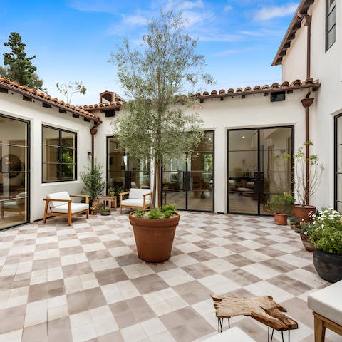 Be transported to Europe in the home's enclosed courtyard