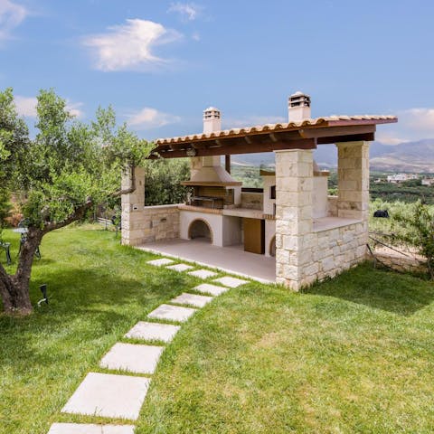 Head over to the covered outdoor kitchen and serve up a Grecian feast to guests seated on the verandah