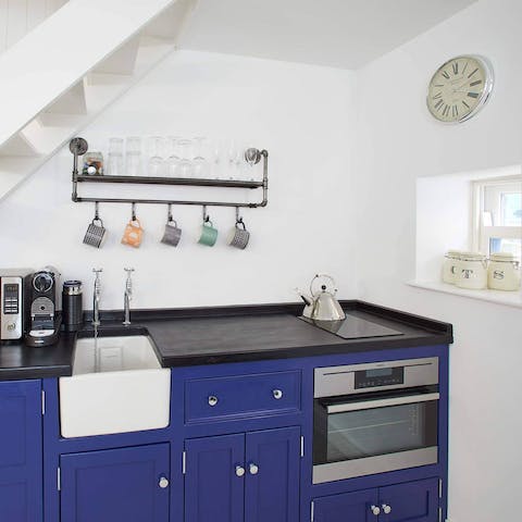 Prepare your breakfast and coffee in the sweet blue kitchen each morning