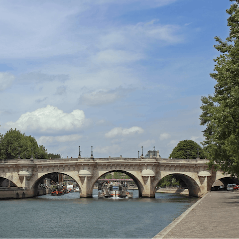 Grab a coffee to go and take a stroll along the Seine (just fifteen minutes from your door)