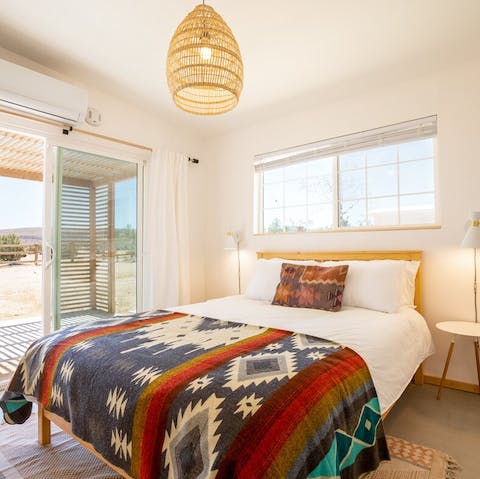 Wake up feeling refreshed in the bright, boho chic bedrooms