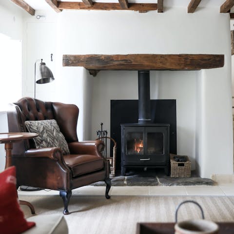 Unwind with a good book in front of the wood-burning stove
