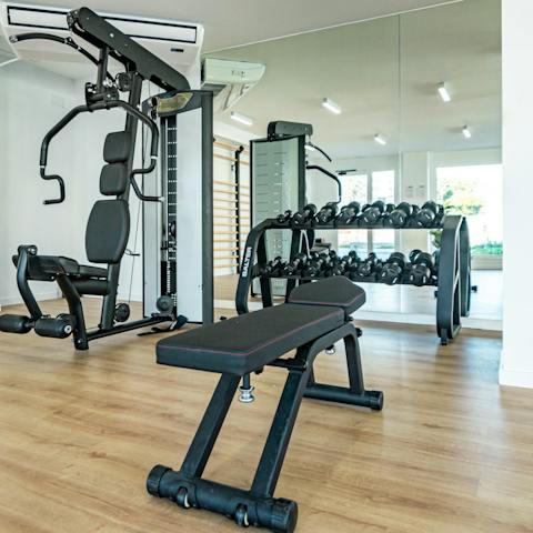 Stay on top of your goals with a workout in the communal gym 