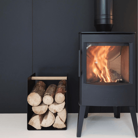 Warm up with a whiskey in front of the wood-burning stove