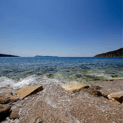 Relax on the local pebbled beach in Rabac, and take a dip in the crystal-clear sea