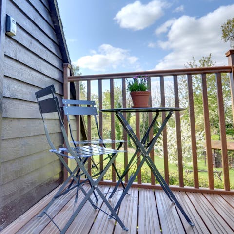 Sip your morning coffee on the balcony overlooking the surrounding nature 