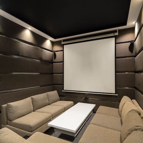 Indulge in a movie night with loved ones in your cinema room